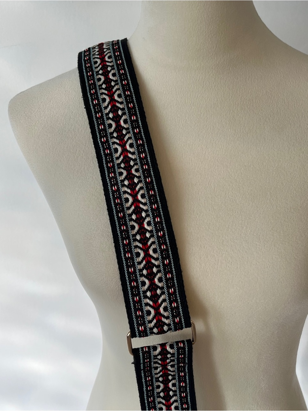 Adjustable Guitar Strap with Black, Red, and White Pattern
